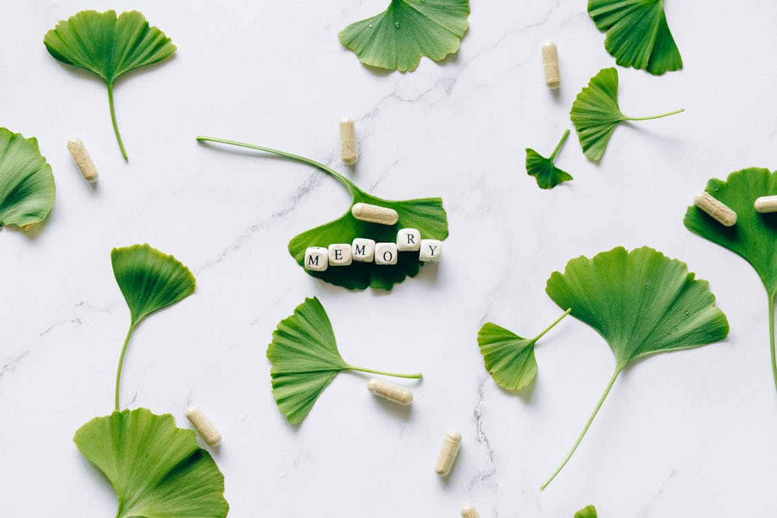Best supplements for brain fog and memory arranged on white surface